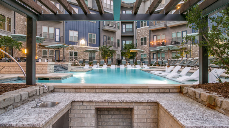 Resort-style pool with swim-up bar