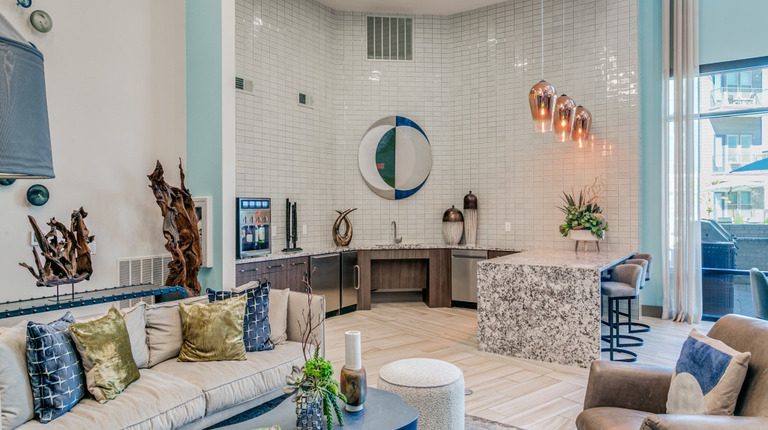 Spacious resident lounge with demonstration kitchen