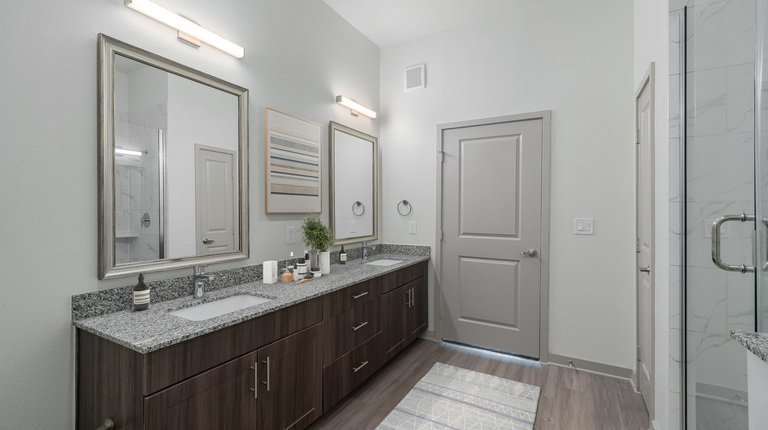Spacious Bathroom with Double-Vanity and Walk-In Shower