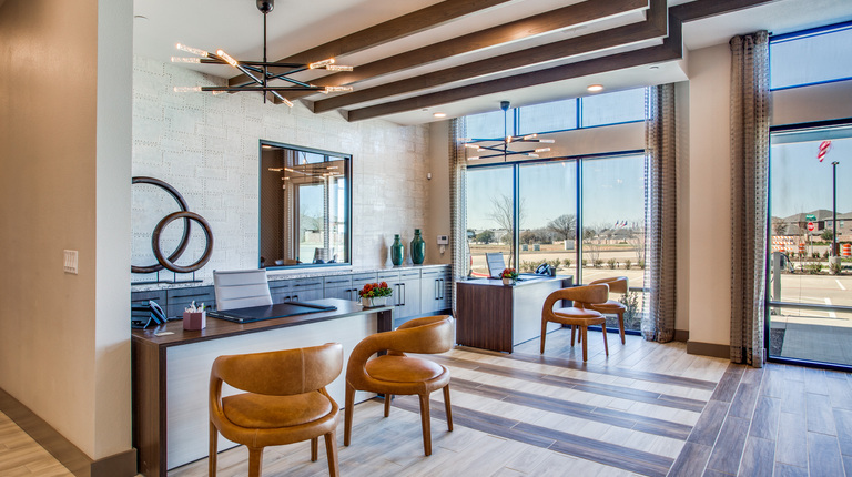 Leasing office with floor-to-ceiling windows